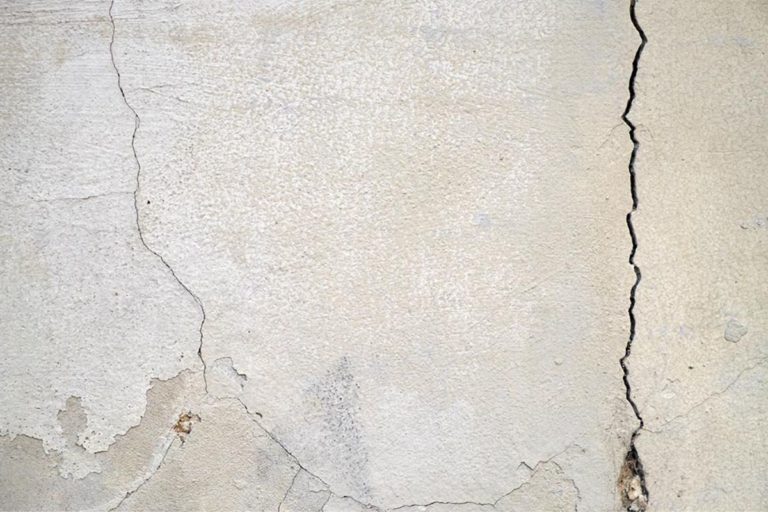 What are the Potential Causes of Various Types of Wall Cracks?